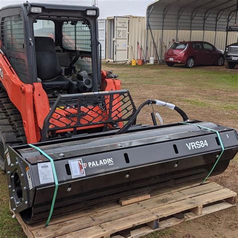 vibratory roller skid steer attachment